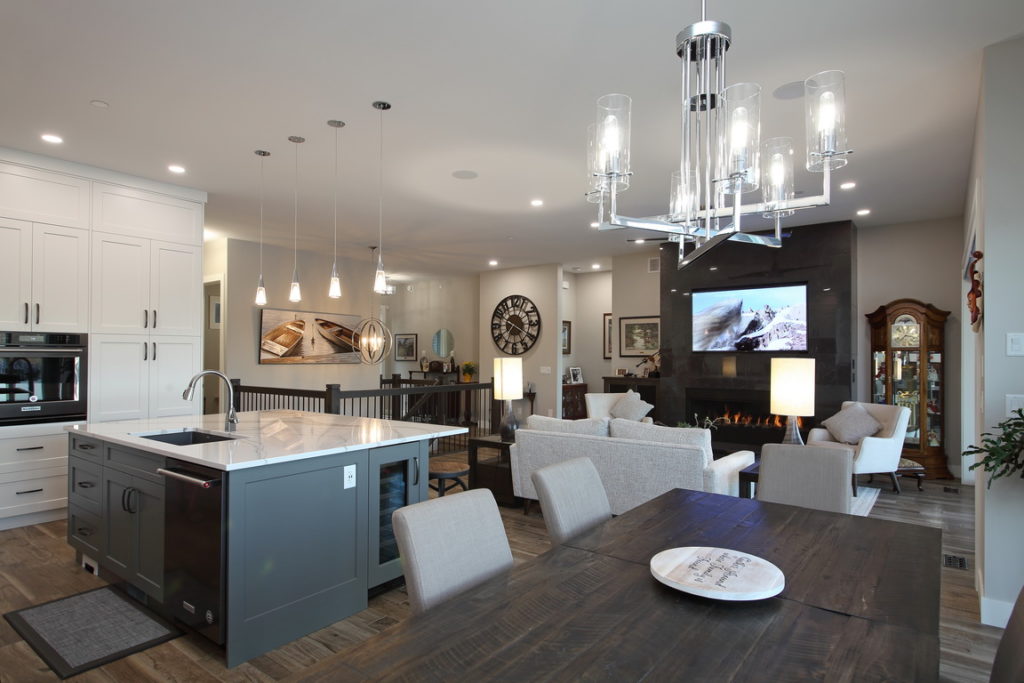Photo of living room, dining room and family room with slate fireplace at the Keech residents.