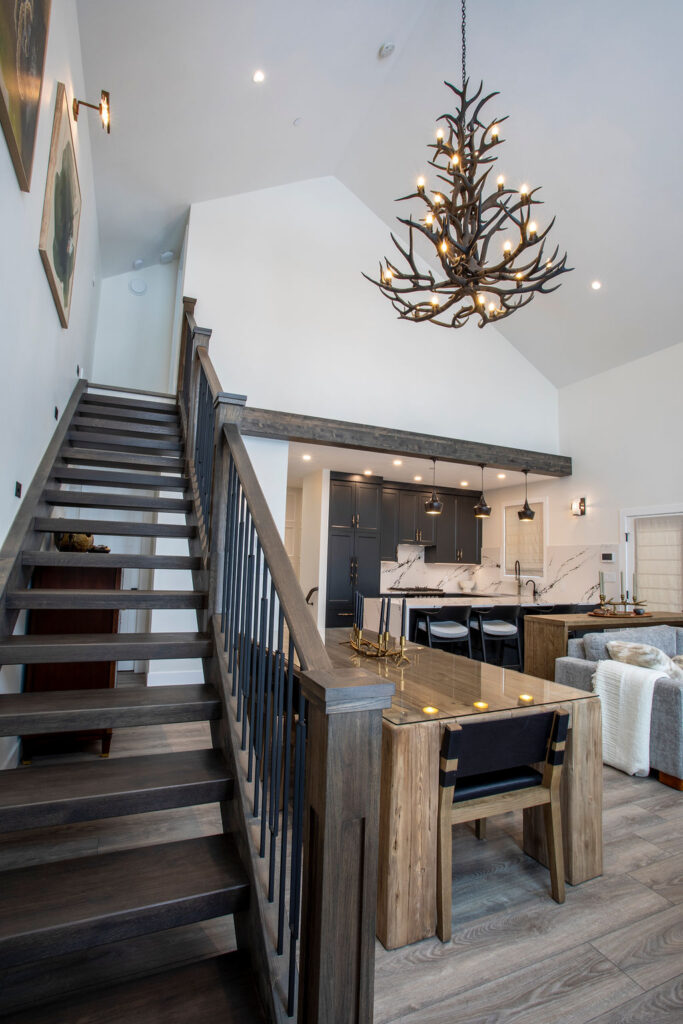 Cozy living room setup with a large mirror, plush seating, and fur accents.